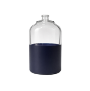 Clear glass bottle with navy liquid
